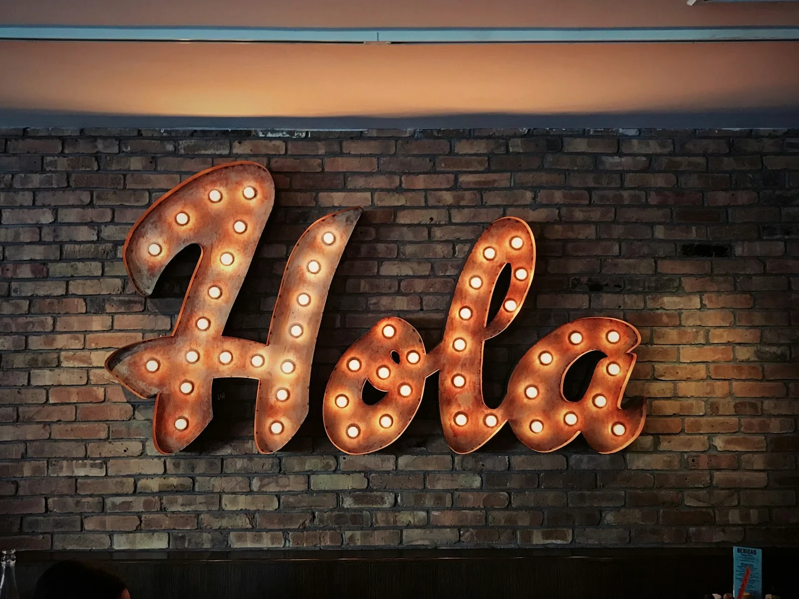 Photo by Jon Tyson Hola LED signage
